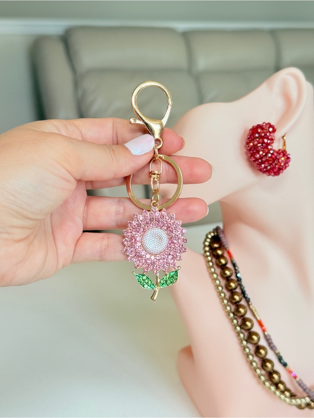 Gold-Tone Pink Crystal Sunflower Keychain with Green Leaves